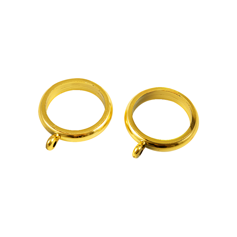 Varão de cortina com adesivo dourado