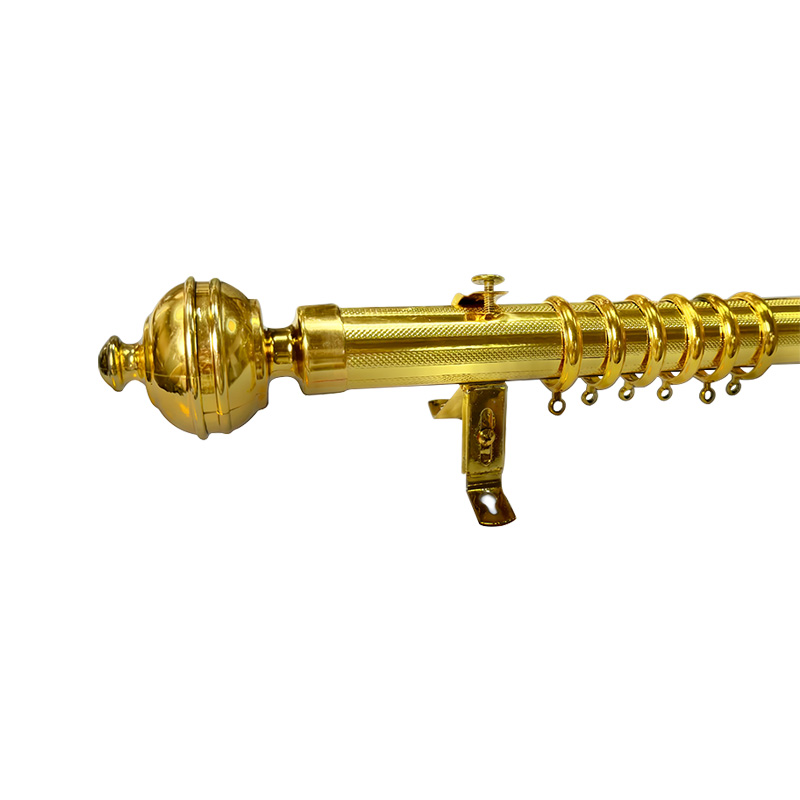 Varão de cortina com adesivo dourado
