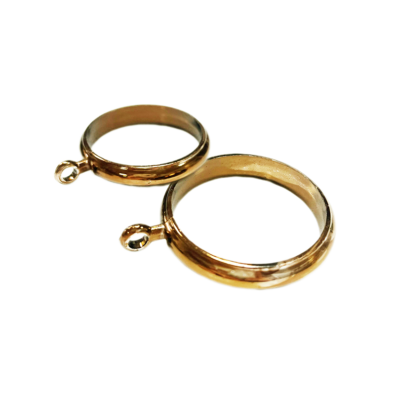 Varão de cortina com adesivo dourado de titânio